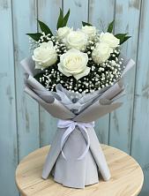Букет цветов из:  Розы в Уральском